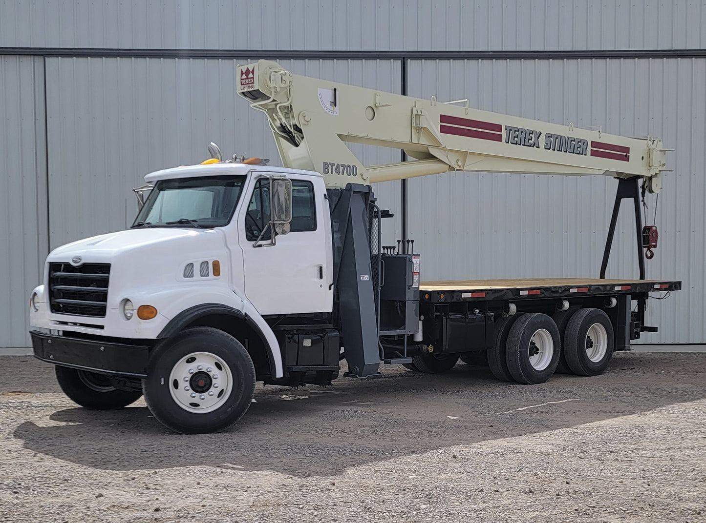 Camión Sterling LT7500 con Grúa Terex BT-4792