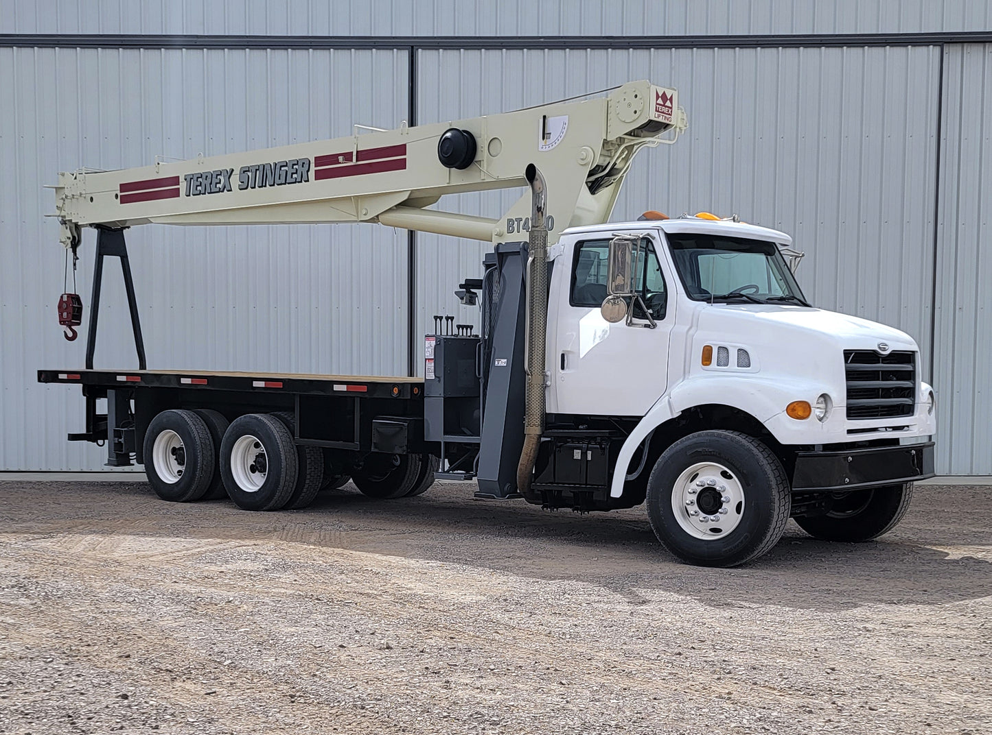 Camión Sterling LT7500 con Grúa Terex BT-4792