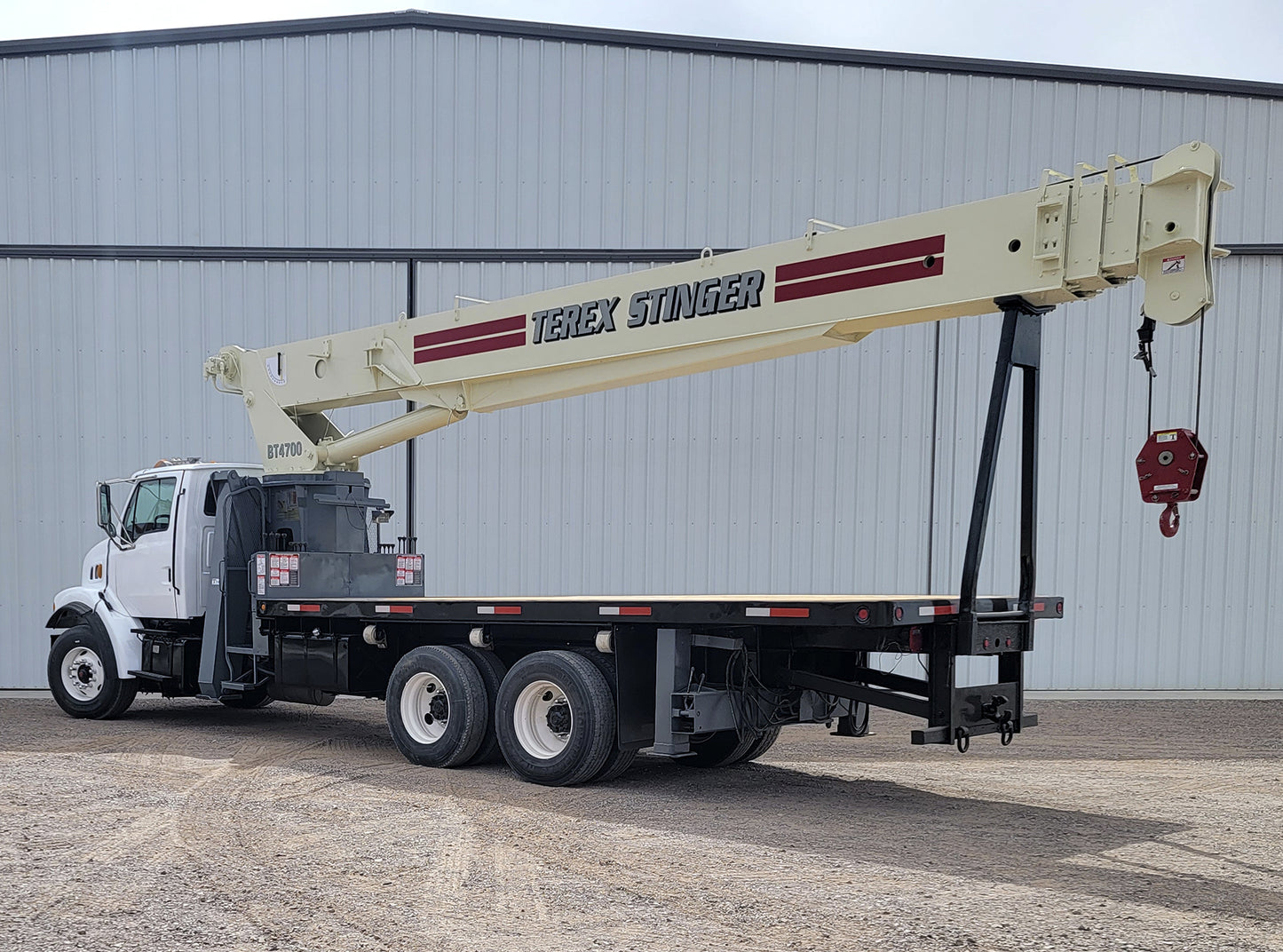 Camión Sterling LT7500 con Grúa Terex BT-4792